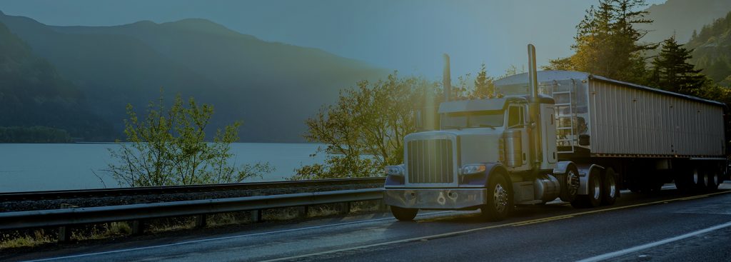The Price Digests 2023 Truck Blog is published! Decorative image with truck driving down the highway